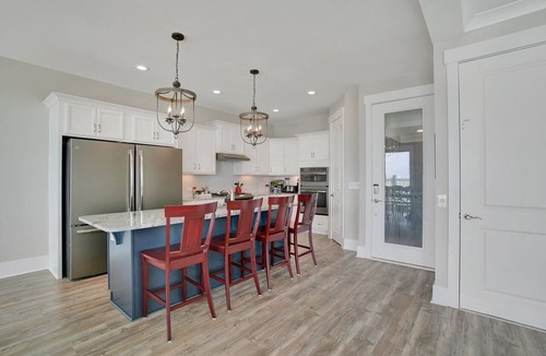 Long Beach Hotel | Spacious oceanfront 7-bedroom home on Oak Island, perfect for large gatherings.