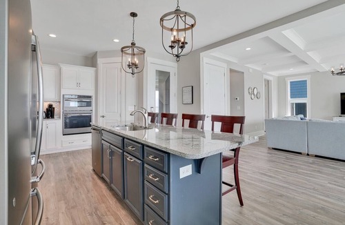 Long Beach Hotel | Spacious oceanfront 7-bedroom home on Oak Island, perfect for large gatherings.