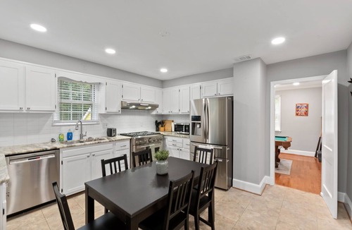 Del Ray House | Stately 5BR Historic Retreat - CozySuites