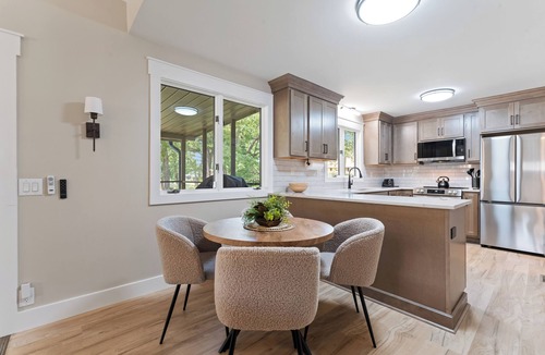 Mayhew House | Stylish 3BR Waterfront Home w/Sunset Porch | Sunsets on Shoreline by Avantstay