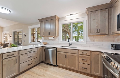 Mayhew House | Stylish 3BR Waterfront Home w/Sunset Porch | Sunsets on Shoreline by Avantstay