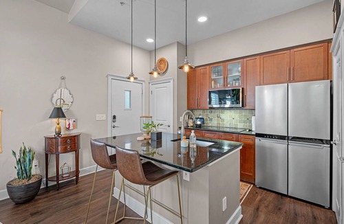 First Ward Condo | Stylish Uptown Pied-à-Terre With City View