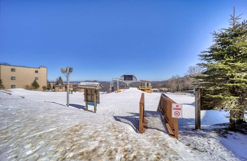 Sugar Mountain Condo | Sugar Ski Ski-In Ski-Out. 2 Bedroom. Pool+Hot tub. 150 feet from slope and pool.