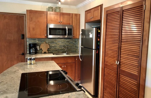 Kihei Condo | Summer DEALS! Partial Ocean View Condo with pool - just steps from the beach.