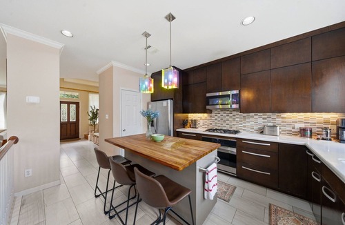 Midtown House | Sun-Drenched 4BR Midtown Oasis, Private Parking