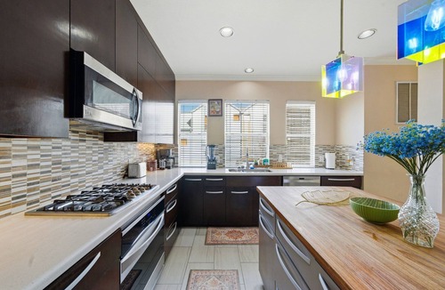 Midtown House | Sun-Drenched 4BR Midtown Oasis, Private Parking