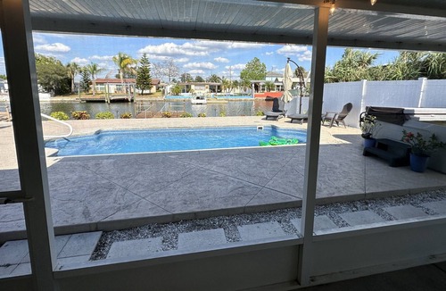 Hudson Beach Estates House | Sunny Waterfront Oasis! Private Pool, Hot Tub & Dock!