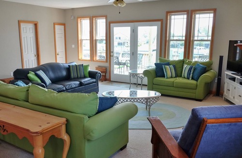 Colington Harbour House | Sunset Memories on the water. Large Private Dock, Kayaks, Paddleboards & Canoe.