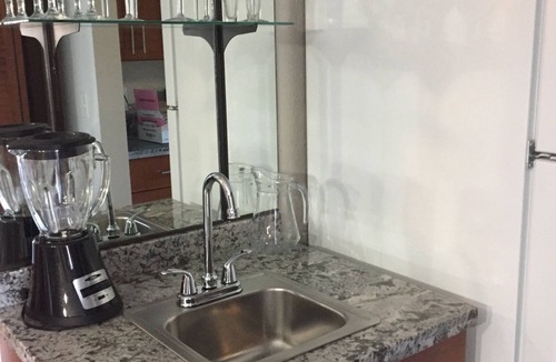 Kihei Condo | Tastefully upgraded. One of the only resort units with a full size laundry team.