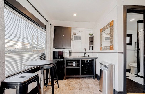 Washington Ave./ Memorial Park Apartment | Tattoo Studio-this converted tattoo studio faces all the Washington Ave action