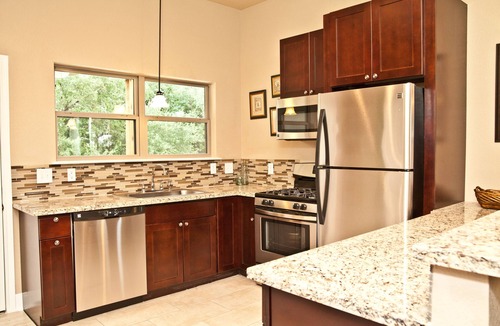 Kyle House | "The Garden"/A little bit country, close to town, new, fresh and clean.