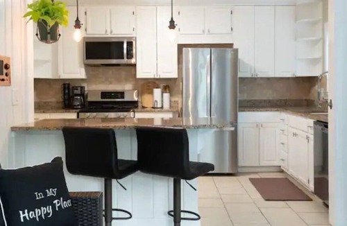 Sheffield Park House | The Olive Door Oasis - Large house in a quiet neighborhood with yard and grill!