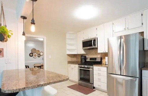Sheffield Park House | The Olive Door Oasis - Large house in a quiet neighborhood with yard and grill!