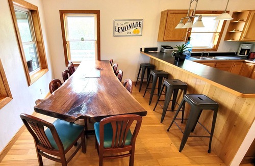 Carova Beach House | The Salty Seahorse! 4x4 beach, private dock, hot tub, pool, Horses. Pet-Friendly