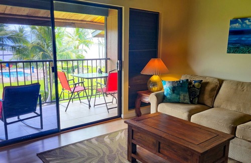 Kaunakakai House | Third-floor condo with ocean views, WiFi, pool, grills & washer/dryer