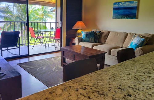 Kaunakakai House | Third-floor condo with ocean views, WiFi, pool, grills & washer/dryer