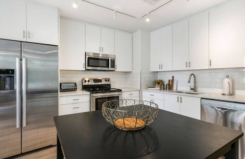 Central Business District Hotel | Timeless Elegance: 4BR Luxury Condo in New Orleans