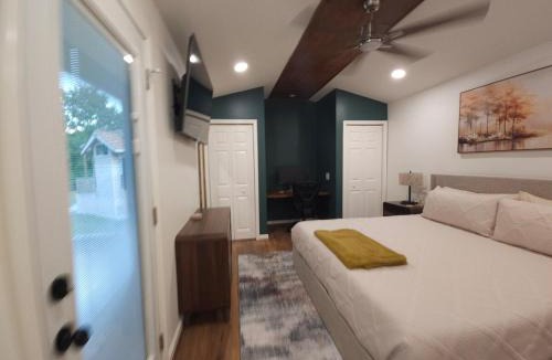 Phenix City House | Tiny Home with Grill Laundry Deck Desk