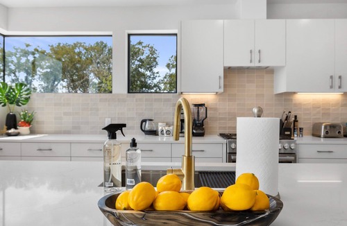 MLK House | Trendy East Austin Condo with Rooftop Deck + Downtown Views - Rayne