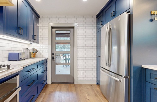Kingsland Cottage | Unique retreat with pickleball, cornhole, decks, grill, fireplace, AC, & W/D