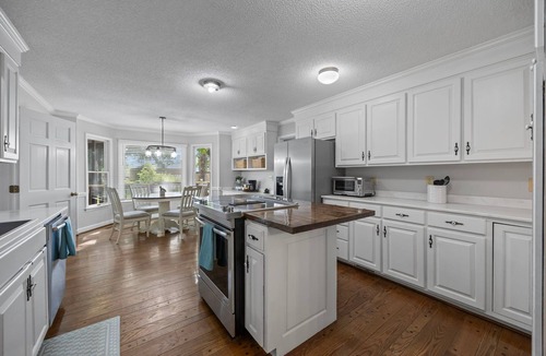 Henderson House | Updated Farmhouse Retreat Near Kerr Lake