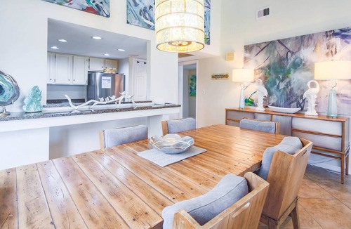 South Beach Condo | Updated & Gorgeous End Unit with Spectacular Views of Pool & Sound. South Beach Oasis Awaits you!