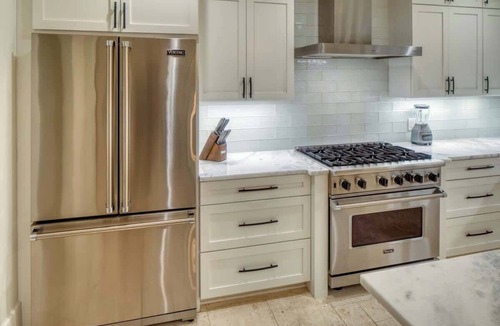 Hitch Village - Fred Wessels Homes Condo | Updated Historic Villa with Parking & Walk to River St.