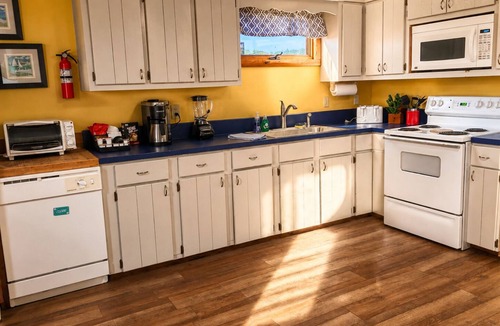 Kill Devil Hills Cottage | Walk to Beach ·560 ft · King Bed· Dogs Welcome ·
