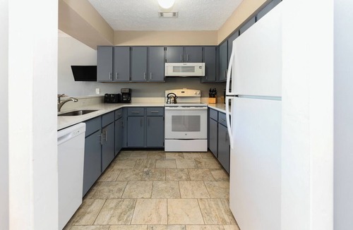Surfside Beach Condo | Walk to the beach 2 BR Condo with Shared Pool! Sea Grove 106