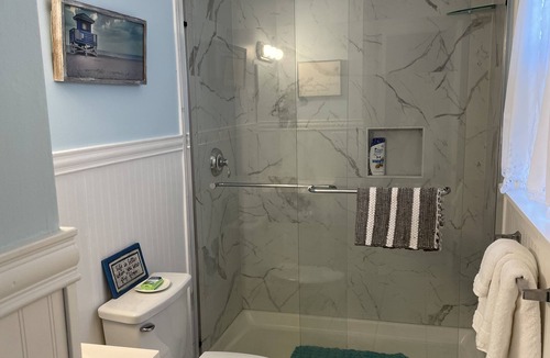 Myrtle Grove House | Walking distance to the ICW, mancave with a pool table and outdoor kitchen.
