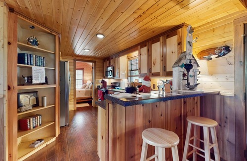 Ledbetter Cabin | Water-view rustic cabin with large front porch, W/D, streaming, kitchen, & AC