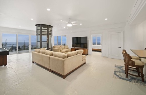 Ninole House | Waterfalling Estate: Oceanfront Luxury w/ Private Waterfall, Pool & More!