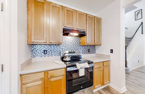 Westside House | Waterfront 2-story home with water views, patio, streaming, washer/dryer, & AC