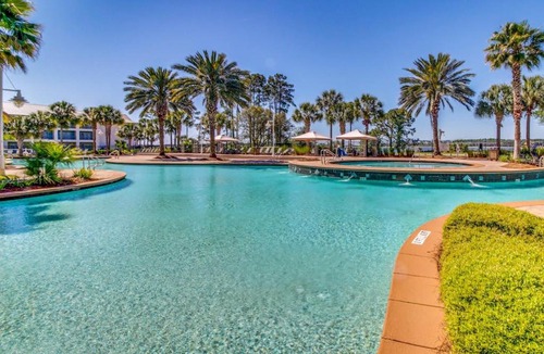 Upper Grand Lagoon House | Waterfront condo with central AC and access to resort pool & hot tub