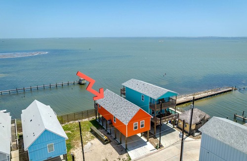 Flour Bluff House | Waterfront Escape w/Views | Shared Pool & Boat Dock | Orange Crush by AvantStay
