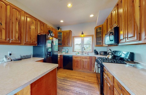 Sunset Village House | Waterfront home with pool, private hot tub, ocean view, W/D & AC - dog-friendly