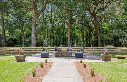 Covington House | "Whispering Oaks" Enjoy this 4-bedroom home with HUGE backyard