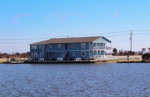 Nags Head Apartment | Wren Watch 1 Queen Regular Fin N Feather