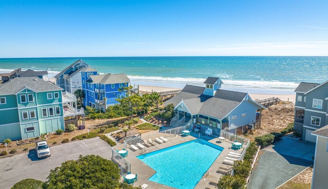 2-story home near the beach with beach access, deck, community pool & tennis