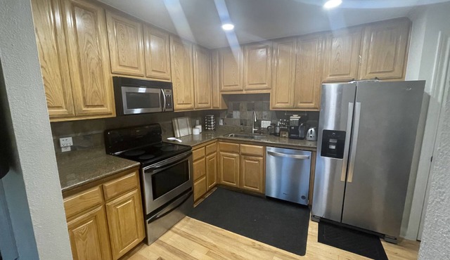 2000 sq ft two story 2 bedroom 1 bath condo w/ fenced patio