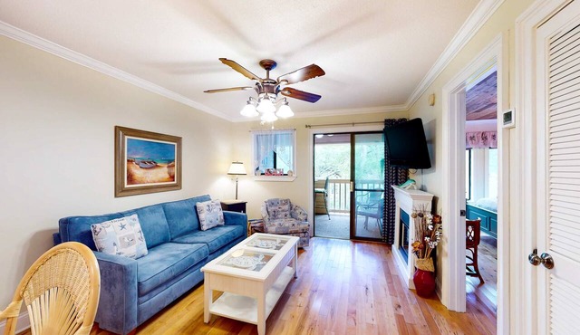 3rd-floor condo with water views, balcony, pools, gym, & beach access