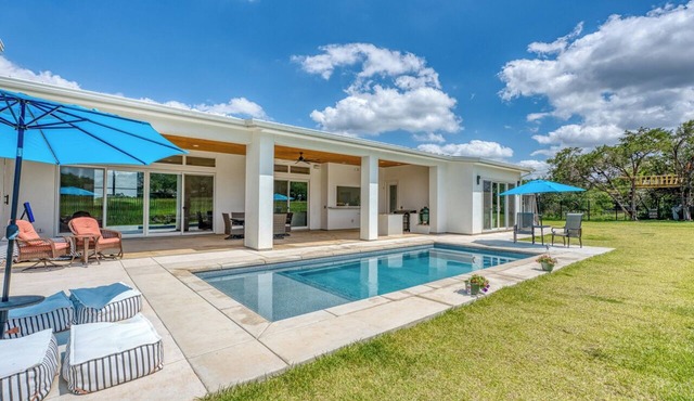 Amazing 4-bedroom House with Pool, Golf Simulator, and Batting Cage.