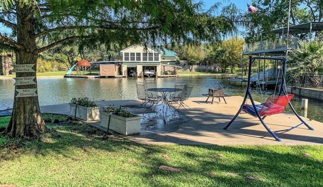 Charming dog-friendly lakefront home with lake view, dock, & washer/dryer