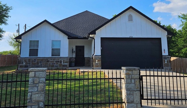 Charming, newer, 3 bedroom home with gated boat and watercraft parking in back.