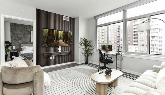City View 2BR Retreat with Rooftop, Gym & Parking