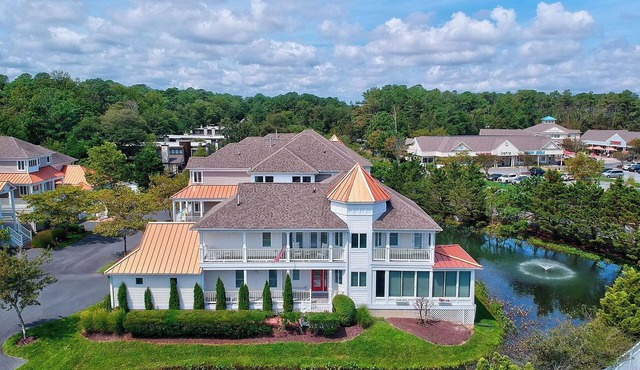Elegantly designed 4 bed, 4.5 bath home in the exclusive Sandcastle Community of Sea Colony; Private Beach, Community Pools, Fitness, Tennis, Playgrounds, Basketball Courts.