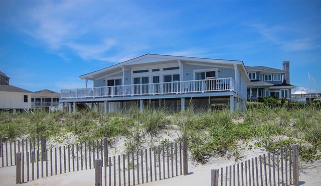 Experience the beach life with this relaxing oceanfront home.