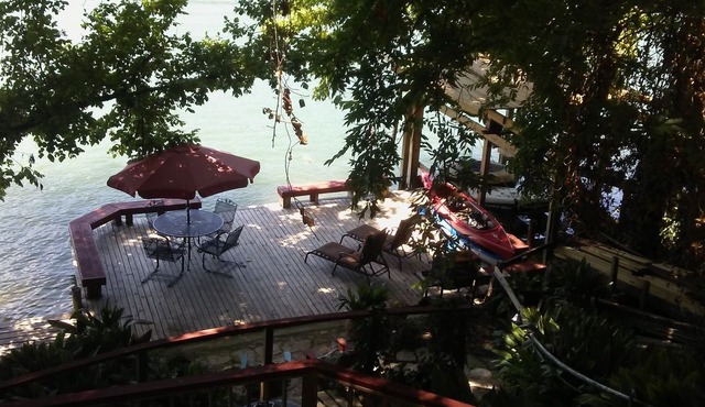 Kayak, Paddleboard, Fish & relax on the decks of this beautiful Waterfront Home