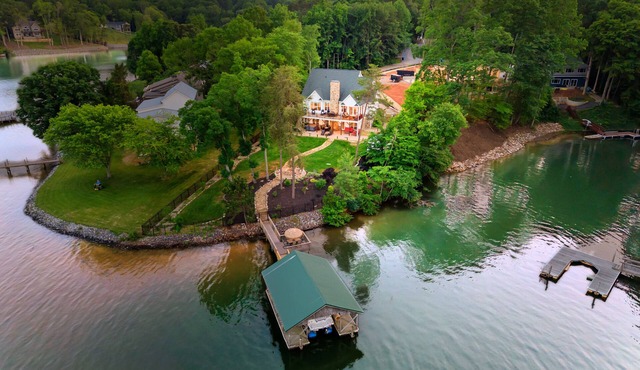 Lake Views with Firepit & Dock Access | Spacious Waterfront Home by AvantStay