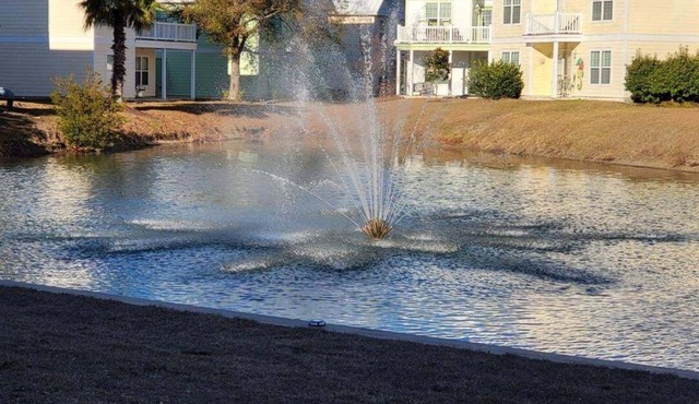 Lakefront Oceanside Village: 2 Golf Carts, Pools, Private Beach Parking